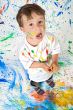 Boy playing with painting