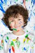Boy playing with painting