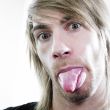 Man sticking tongue out