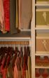 neatly organized womens closet