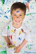 Boy playing with painting