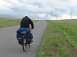 One cyclist go to road.