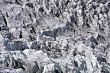 Two people trekking on a glacier