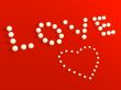 3D heart from pearls, on a red velvet