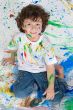 Boy playing with painting
