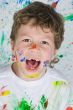 Boy playing with painting