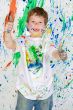 Boy playing with painting