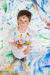 Boy playing with painting