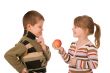 Two children and an apple