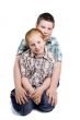 young boy is protecting little girl