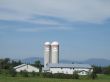 a farm with two tall silos