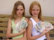 Two girls with the Byelorussian money