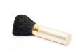 Gold makeup brush isolated