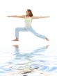 virabhadrasana warrior pose on white sand 4