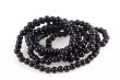 Black pearl necklace.