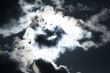 Moon and clouds on the dark sky