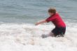 Boy Playing in the Ocean