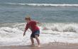Boy Playing in the Ocean
