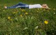 Woman lying on grass