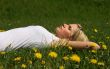 Woman lying on grass