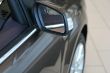 detail of new car in dealership showroom