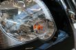 detail of new car in dealership showroom