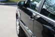 detail of new car in dealership showroom