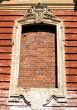 The old window immured by a bricklaying