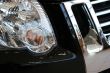 detail of new car in dealership showroom