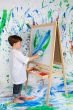 Boy playing with painting