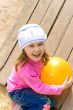 child holds a ball