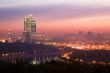 Sunrise, river, unfinished high-rise building