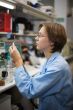 Scientist with syringe