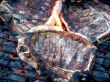 Grilled T-Bone Steaks Still Cooking