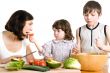 mother and children cooking at the kitchen