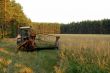 cutting up hay in a field