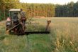 cutting up hay in a field