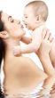 happy mother with baby in water