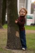 Small beauty girl playing hide-and-seek