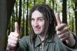 Young man with dreadlock hair.