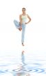 yoga standing on white sand