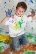 Boy playing with painting