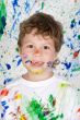 Boy playing with painting