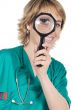 Doctor with magnifying glass