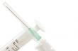 Syringe on white