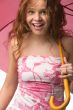 young girl with pink umbrella