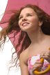 young girl with pink umbrella