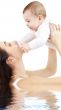 happy mother with baby boy in water 2