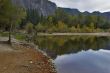 Mountains are reflected in water of lake