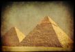 Grunge background with Egyptian pyramids